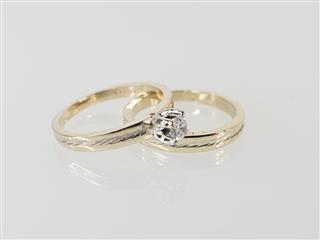 Lady's Diamond Wedding Set .25 CT. 14K Yellow Gold 5.3g Size:6.5